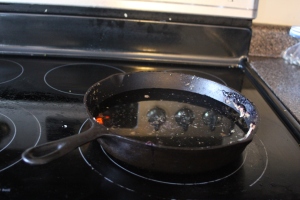 Fill the skillet about halfway full of water. 
